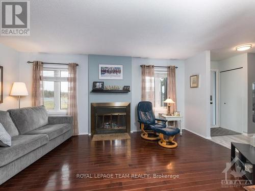 1-7 Timberview Way, Ottawa, ON - Indoor Photo Showing Living Room With Fireplace