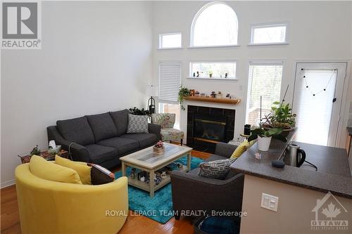 54 Macassa Circle, Ottawa, ON - Indoor Photo Showing Living Room With Fireplace