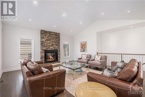 212 Cabrelle Place, Ottawa, ON - Indoor Photo Showing Living Room With Fireplace