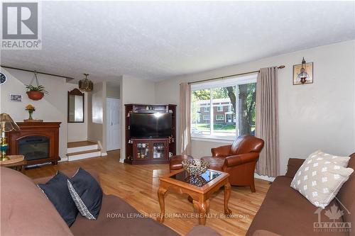 840 Cummings Avenue, Ottawa, ON - Indoor Photo Showing Living Room With Fireplace