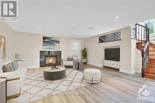 6219 Elkwood Drive, Ottawa, ON - Indoor Photo Showing Living Room With Fireplace