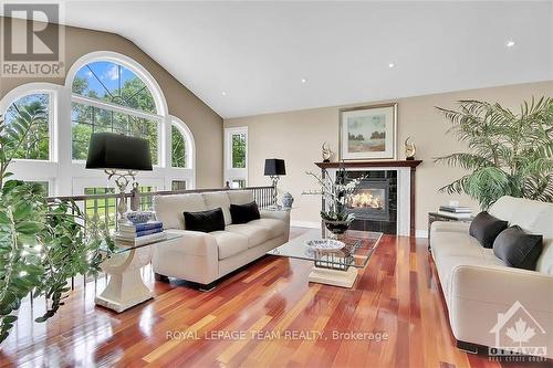 6219 Elkwood Drive, Ottawa, ON - Indoor Photo Showing Living Room With Fireplace