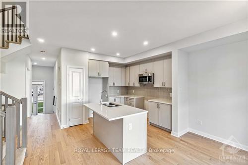 302 Elsie Macgill Walk, Ottawa, ON - Indoor Photo Showing Kitchen With Double Sink