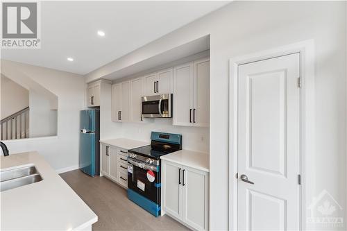 295 Elsie Macgill Walk, Ottawa, ON - Indoor Photo Showing Kitchen With Double Sink