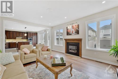 2782 Grand Vista Circle, Ottawa, ON - Indoor Photo Showing Living Room With Fireplace