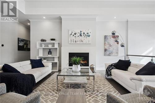 525 Leimerk Court, Ottawa, ON - Indoor Photo Showing Living Room With Fireplace