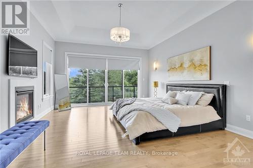 525 Leimerk Court, Ottawa, ON - Indoor Photo Showing Bedroom With Fireplace