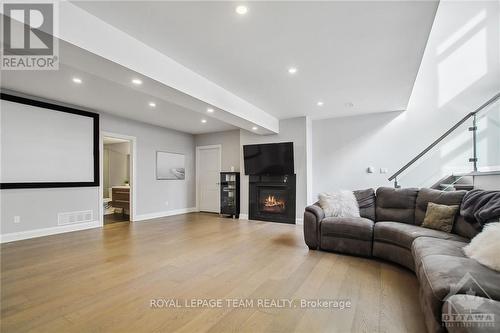 525 Leimerk Court, Ottawa, ON - Indoor Photo Showing Living Room With Fireplace