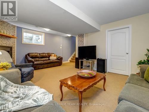 1572 Carronbridge Circle, Ottawa, ON - Indoor Photo Showing Living Room With Fireplace