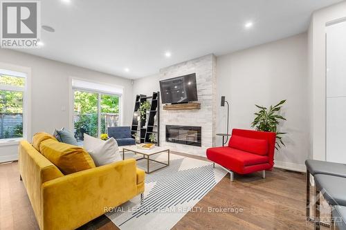 261 Beechwood Avenue, Ottawa, ON - Indoor Photo Showing Living Room With Fireplace