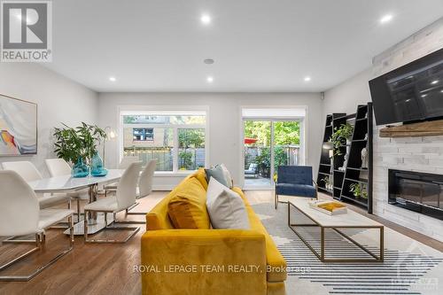 261 Beechwood Avenue, Ottawa, ON - Indoor Photo Showing Living Room With Fireplace