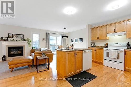 18 Alma Street, North Grenville, ON - Indoor Photo Showing Kitchen With Fireplace With Double Sink