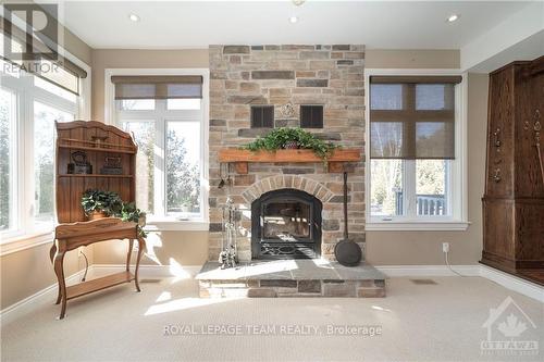 5785 Longhearth Way, Ottawa, ON - Indoor Photo Showing Living Room With Fireplace