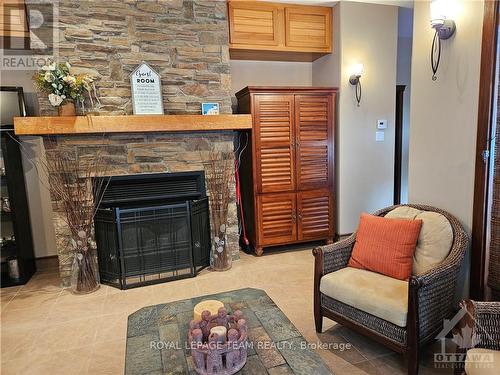 5849 Queenscourt Crescent, Ottawa, ON - Indoor Photo Showing Other Room With Fireplace