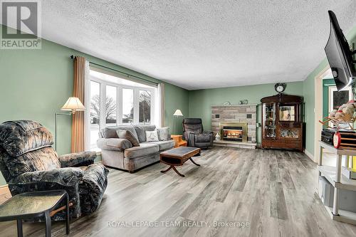 5865 Marine Station Road, South Dundas, ON - Indoor Photo Showing Living Room With Fireplace