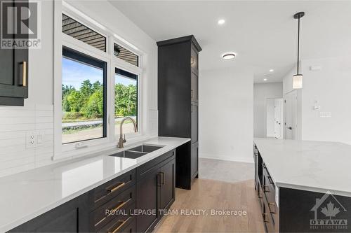 54 Tennant Drive, Rideau Lakes, ON - Indoor Photo Showing Kitchen With Double Sink With Upgraded Kitchen