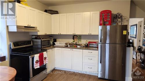 204 Asa Street, North Grenville, ON - Indoor Photo Showing Kitchen With Double Sink