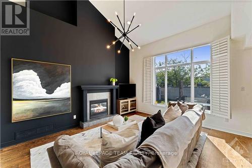 1027 Red Spruce Street, Ottawa, ON - Indoor Photo Showing Living Room With Fireplace