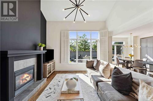 1027 Red Spruce Street, Ottawa, ON - Indoor Photo Showing Living Room With Fireplace