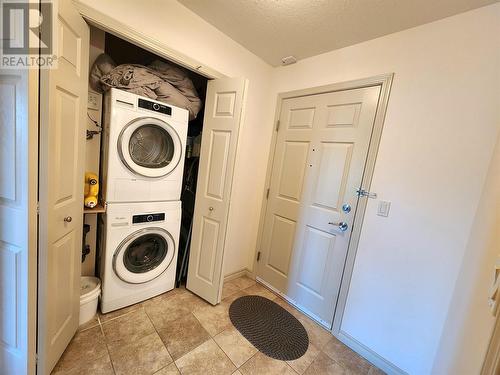 Apartment size washer and dryer - 2125 Atkinson Street Unit# 302 Lot# 12, Penticton, BC - Indoor Photo Showing Laundry Room