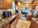 2125 Atkinson Street Unit# 302, Penticton, BC  - Indoor Photo Showing Kitchen With Stainless Steel Kitchen With Double Sink 