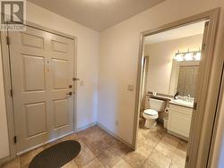 Entrance to condo and second bathroom - 