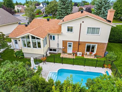 Back facade - 1150 Rue Du Perche, Boucherville, QC - Outdoor With In Ground Pool