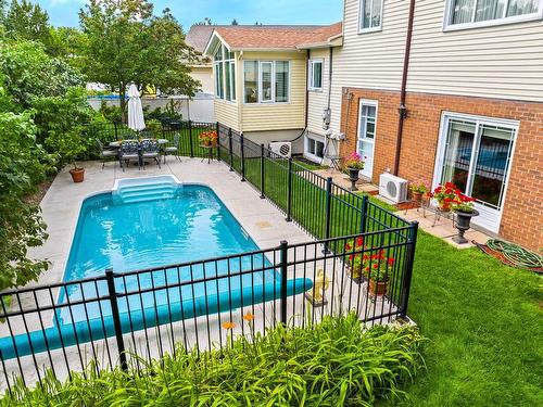 Backyard - 1150 Rue Du Perche, Boucherville, QC - Outdoor With In Ground Pool