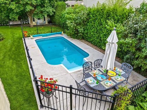 Pool - 1150 Rue Du Perche, Boucherville, QC - Outdoor With In Ground Pool With Backyard