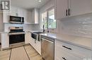 53 Knowles Crescent, Regina, SK  - Indoor Photo Showing Kitchen With Stainless Steel Kitchen With Double Sink With Upgraded Kitchen 