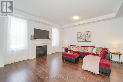 2823 Foxden Square, Pickering, ON - Indoor Photo Showing Living Room With Fireplace