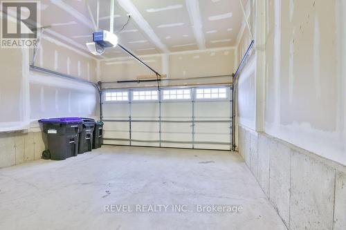 40 Sasco Way, Essa, ON - Indoor Photo Showing Garage