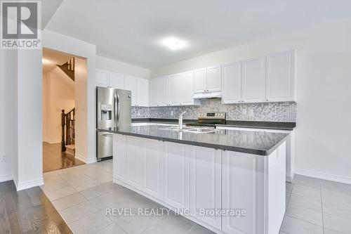 40 Sasco Way, Essa, ON - Indoor Photo Showing Kitchen With Double Sink