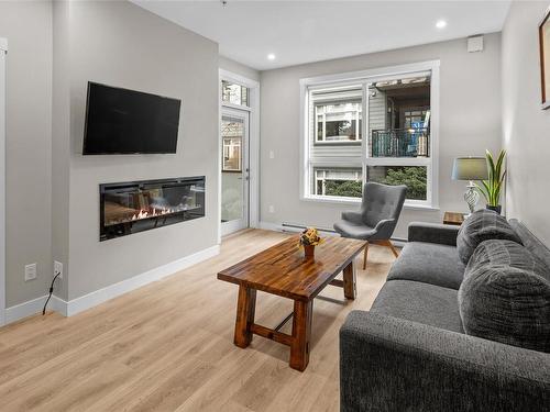 304-2783 Strathmore Rd, Langford, BC - Indoor Photo Showing Living Room With Fireplace