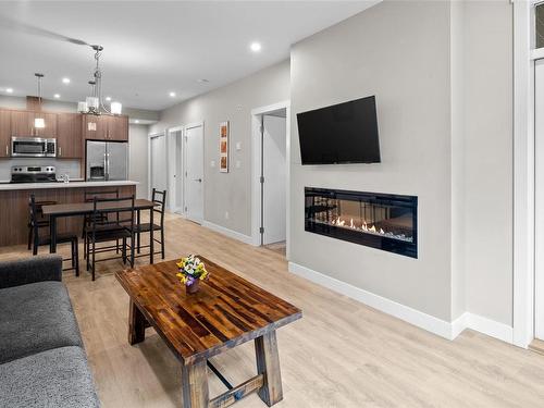 304-2783 Strathmore Rd, Langford, BC - Indoor Photo Showing Living Room With Fireplace