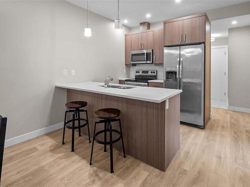 304-2783 Strathmore Rd, Langford, BC - Indoor Photo Showing Kitchen With Stainless Steel Kitchen With Double Sink