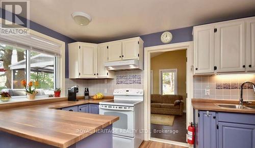 1212- 6 Wahta  #2 Road, Georgian Bay, ON - Indoor Photo Showing Kitchen With Double Sink