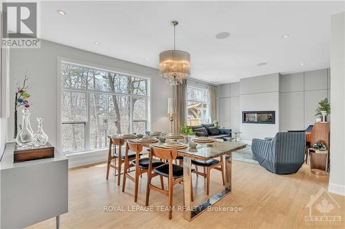 15 Camwood Crescent, Ottawa, ON - Indoor Photo Showing Dining Room With Fireplace