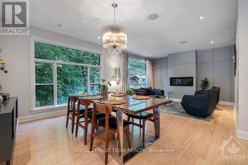 15 Camwood Crescent, Ottawa, ON - Indoor Photo Showing Dining Room With Fireplace