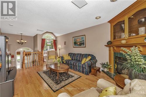 1694 Toulouse Crescent, Ottawa, ON - Indoor Photo Showing Living Room With Fireplace