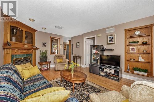 1694 Toulouse Crescent, Ottawa, ON - Indoor Photo Showing Living Room With Fireplace