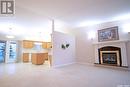 64 Ross Drive, Yorkton, SK  - Indoor Photo Showing Living Room With Fireplace 