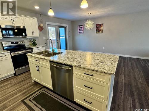 105 Hiller Drive, Air Ronge, SK - Indoor Photo Showing Kitchen With Stainless Steel Kitchen With Double Sink