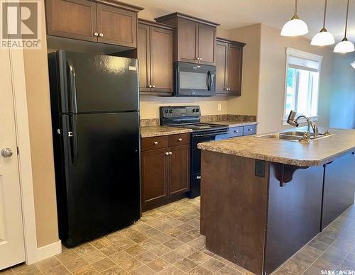 307 Cornwall Street, Regina, SK - Indoor Photo Showing Kitchen With Double Sink