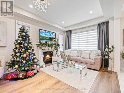 12 Great Falls Boulevard, Hamilton, ON - Indoor Photo Showing Living Room With Fireplace