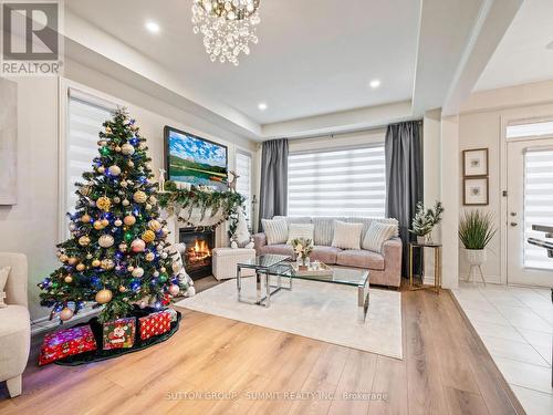 12 Great Falls Boulevard, Hamilton, ON - Indoor Photo Showing Living Room With Fireplace