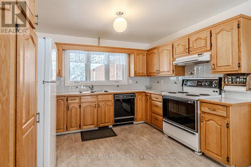 13 Davis Street, South River, ON - Indoor Photo Showing Kitchen With Double Sink