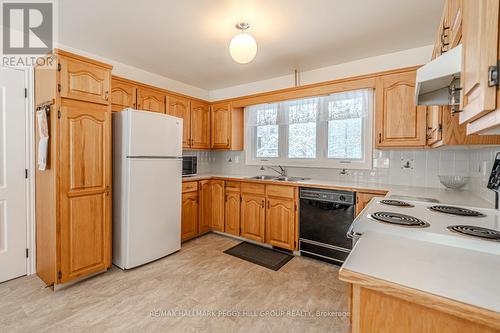 13 Davis Street, South River, ON - Indoor Photo Showing Kitchen With Double Sink