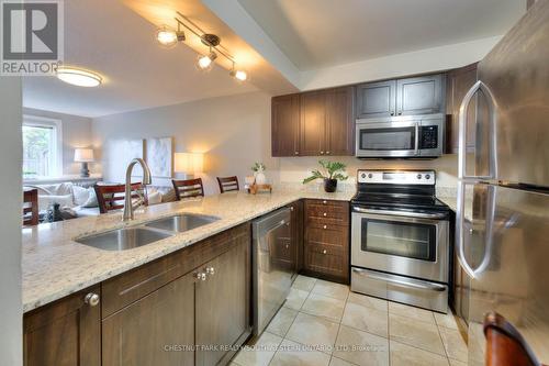 105 - 276 Eiwo Court, Waterloo, ON - Indoor Photo Showing Kitchen With Stainless Steel Kitchen With Double Sink