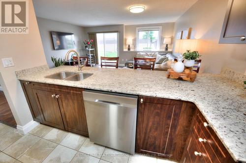 105 - 276 Eiwo Court, Waterloo, ON - Indoor Photo Showing Kitchen With Double Sink